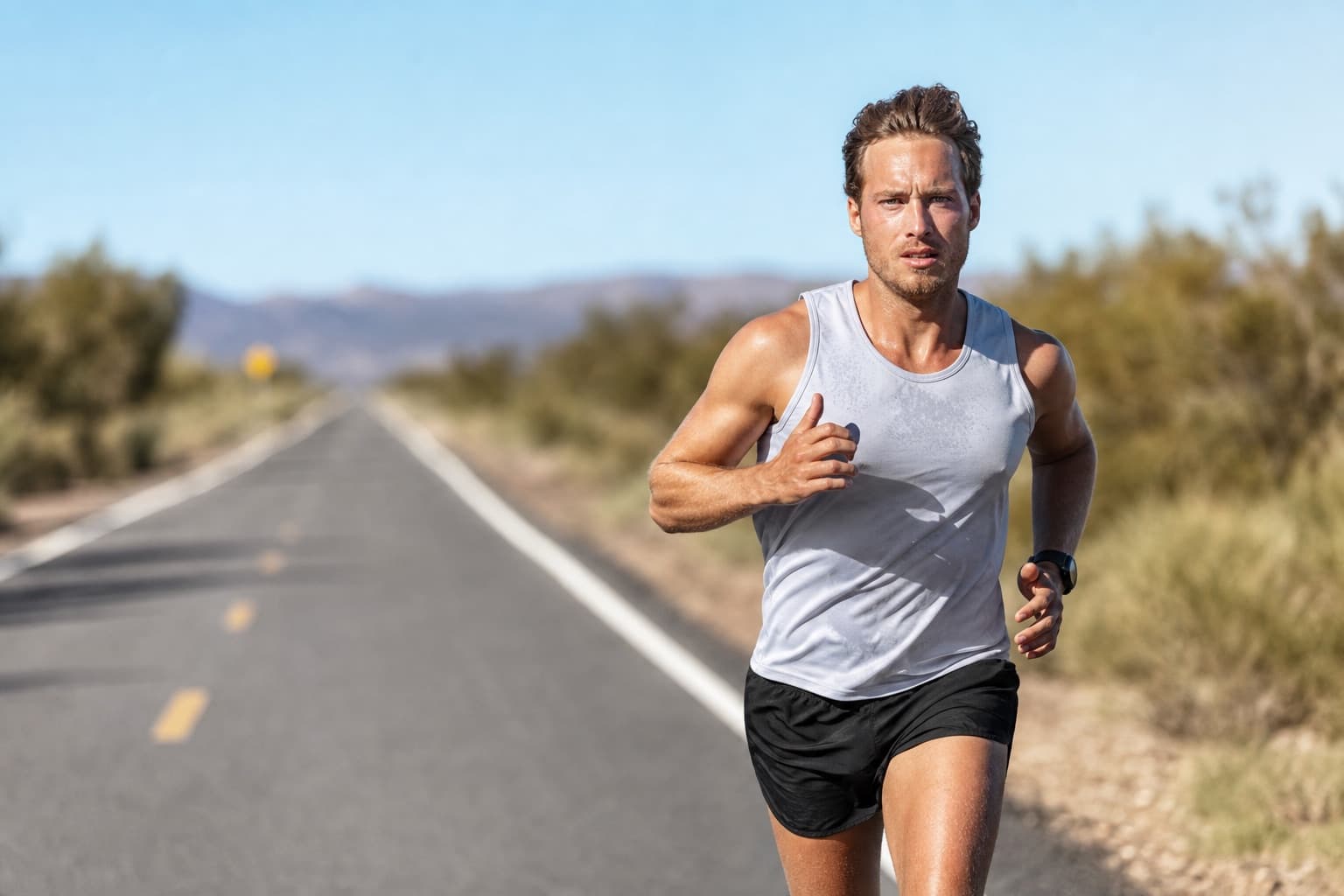 Experienced runner holding goal race pace inside a long training run.