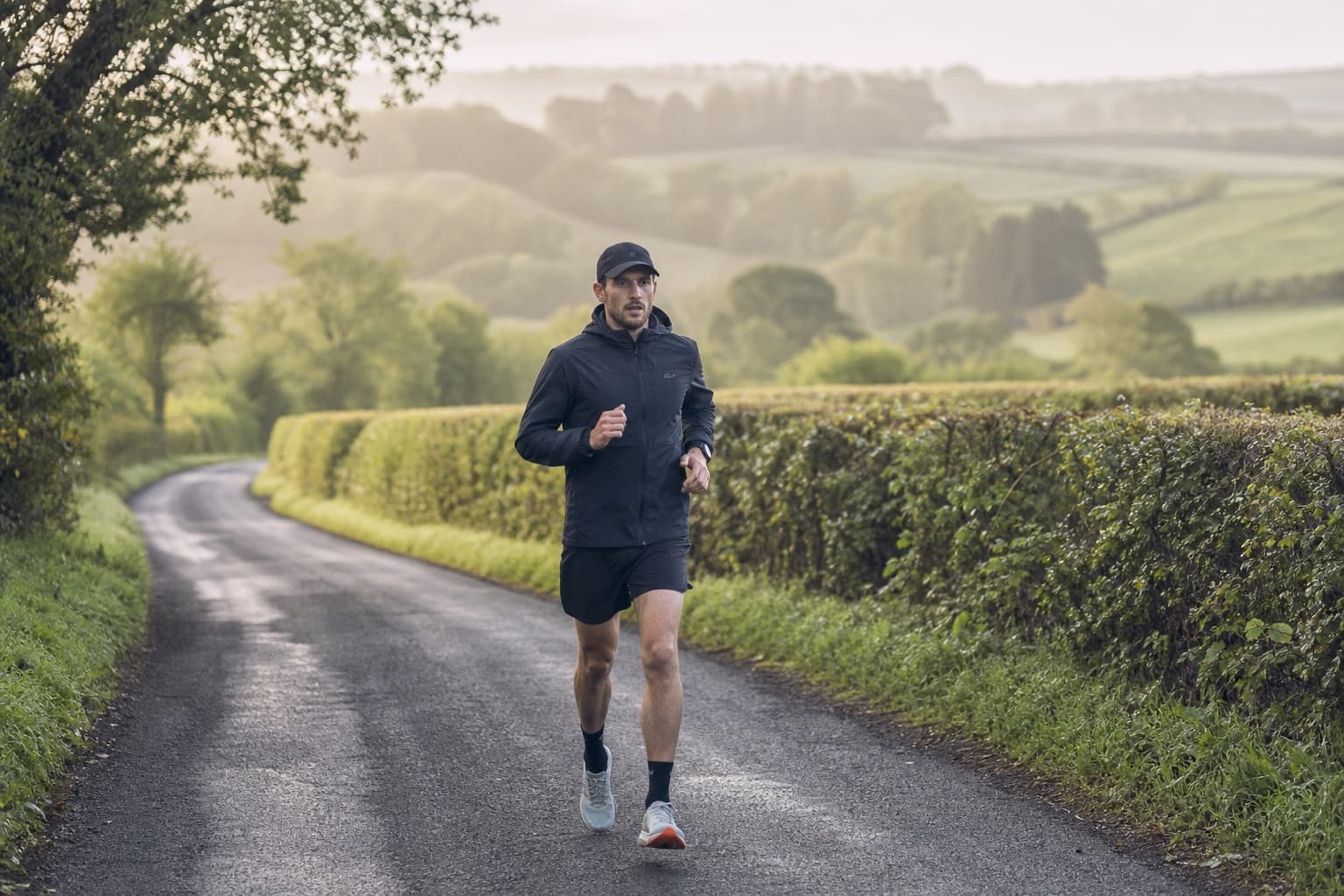 Runner on a long endurance run through open countryside.